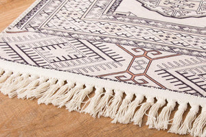 繊細なデザインが特徴的なトルクメン絨毯風プリントラグ MARUFU-307 アイボリー アイボリー - TOCO LIFE